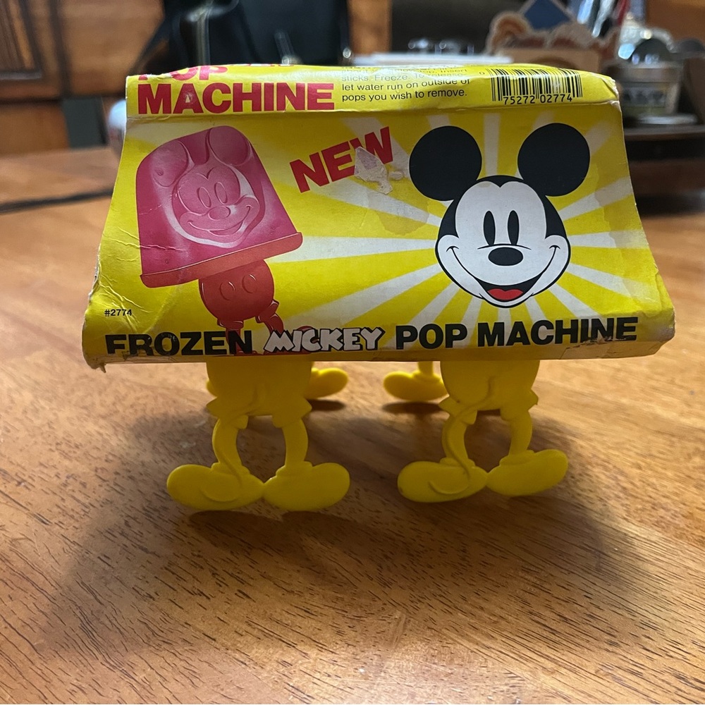 Vintage Mickey Mouse Frozen Mickey Pop Cycle Machine.  New. Very rare yellow!!